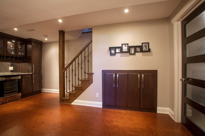 basement with built in under stair storage